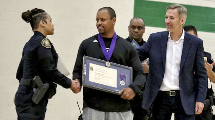 Among those who honored Lowe: the Portland PD, who handed him a Civilian Medal of Heroism.
